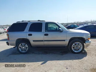 2004 Chevrolet Tahoe LT with VIN 1GNEC13Z84J315648, listed as a IAAI auction lot 41868112 with 198,901 mi miles. Bid and sale history available at carsss.com. Image 13.