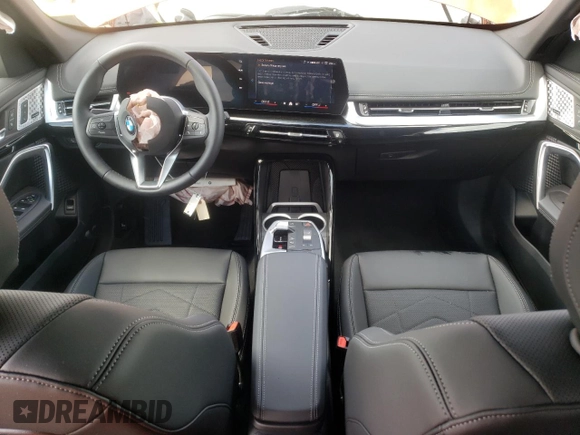 2025 BMW X1 xDrive28i with VIN WBX73EF03S5094250, listed as a Copart auction lot 51174465 with 51 mi miles and Salvage title. Bid and sale history available at DreamBid. Image 8.