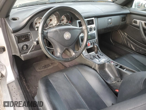 2001 Mercedes-Benz SLK 230 Kompressor with VIN WDBKK49F21F193606, listed as a Copart auction lot 47139945 with 156,424 mi miles and Salvage title. Bid and sale history available at DreamBid. Image 8.