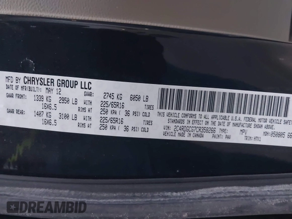2012 Dodge Grand Caravan SXT with VIN 2C4RDGCG7CR358266, listed as a IAAI auction lot 41582428 with 169,137 mi miles and . Bid and sale history available at DreamBid. Image 9.