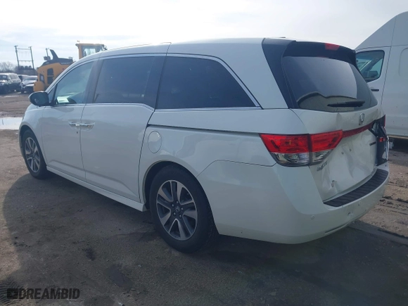 2015 Honda Odyssey Touring Elite with VIN 5FNRL5H9XFB121921, listed as a IAAI auction lot 41858551 with 61,506 mi miles. Bid and sale history available at carsss.com. Image 3.