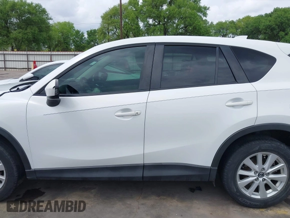 2013 Mazda CX-5 Touring with VIN JM3KE2CE5D0117714, listed as a IAAI auction lot 41889900 with 200,949 mi miles. Bid and sale history available at carsss.com. Image 14.