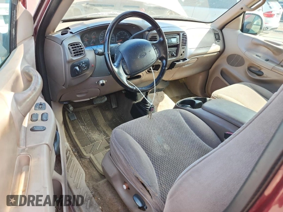 1997 Ford F-150 XL z VIN 1FTDX186XVKB29967, wystawiony jako Copart lot #63531805 z przebiegiem 178 616 mil mil oraz Czysty tytuł • Clean title. Historia ofert i sprzedaży dostępna na DreamBid. Obrazek 8.
