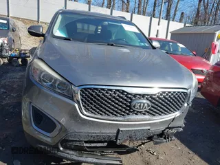 2016 Kia Sorento LX with VIN 5XYPGDA39GG061748, listed as a IAAI auction lot 41720011 with 124,084 mi miles. Bid and sale history available at carsss.com. Image 13.