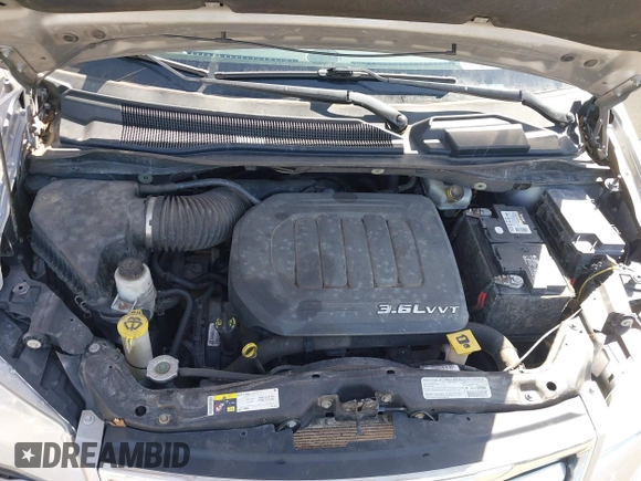 2013 Chrysler Town & Country Touring L with VIN 2C4RC1CG6DR660858, listed as a IAAI auction lot 41970976 with 140,299 mi miles and . Bid and sale history available at DreamBid. Image 10.