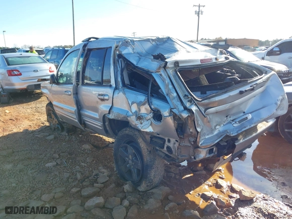 2004 Jeep Grand Cherokee Limited with VIN 1J4GW58S14C102826, listed as a IAAI auction lot 41081734 with 116,950 mi miles. Bid and sale history available at carsss.com. Image 3.
