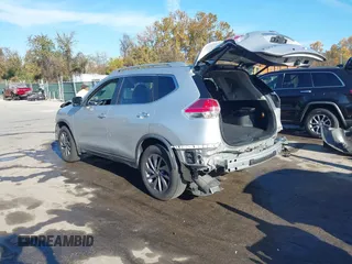 2016 Nissan Rogue SV with VIN KNMAT2MV6GP733975, listed as a IAAI auction lot 40775934 with 68,718 mi miles and . Bid and sale history available at DreamBid. Image 3.