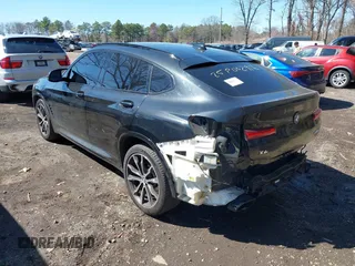 2022 BMW X4 M40i with VIN 5UX43DT04N9K92572, listed as a IAAI auction lot 41985086 with 64,743 mi miles and . Bid and sale history available at DreamBid. Image 3.