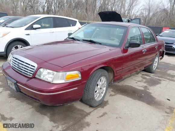 2005 Ford Crown Victoria LX with VIN 2FAFP74W25X106106, listed as a IAAI auction lot 41825793 with 175,740 mi miles. Bid and sale history available at carsss.com. Image 2.
