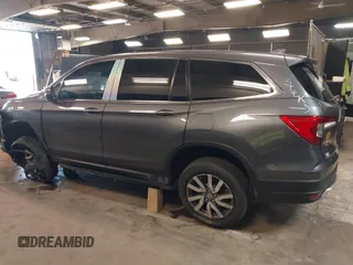 2022 Honda Pilot EX-L with VIN 5FNYF6H59NB000754, listed as a IAAI auction lot 42090576 with 32,813 mi miles and . Bid and sale history available at DreamBid. Image 3.