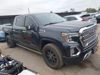 2020 GMC Sierra 1500 Denali with VIN 3GTU9FEL6LG360466, listed as a IAAI auction lot 41100892 with 84,881 mi miles and . Bid and sale history available at carsss.com. Image 1.