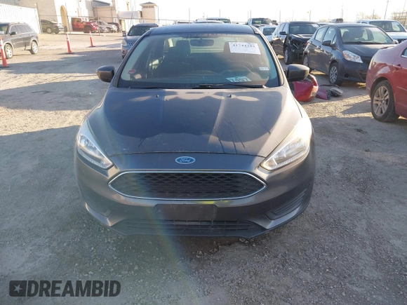 2018 Ford Focus SE with VIN 1FADP3F20JL216525, listed as a IAAI auction lot 41744383 with 92,385 mi miles. Bid and sale history available at carsss.com. Image 12.