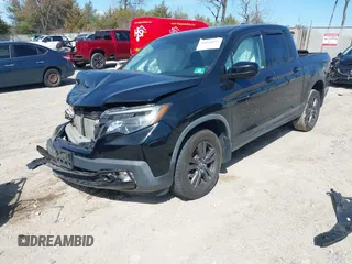2019 Honda Ridgeline Sport with VIN 5FPYK3F15KB011862, listed as a IAAI auction lot 41834653 with 54,328 mi miles and . Bid and sale history available at DreamBid. Image 2.