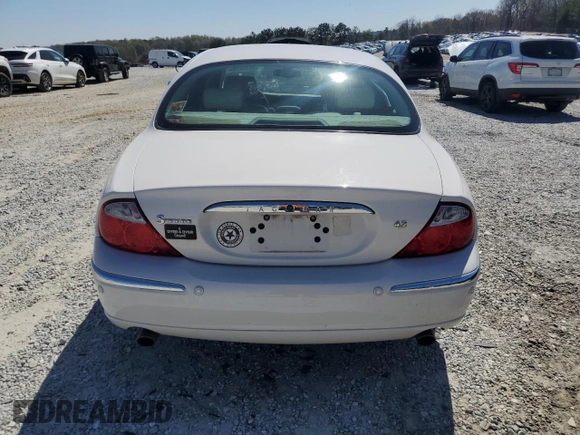 2004 Jaguar S-Type with VIN SAJEA01U14HN09950, listed as a Copart auction lot 48183785 with Not Provided miles and Salvage Title. Bid and sale history available at DreamBid. Image 6.