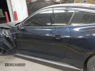 2021 Ford Mustang EcoBoost with VIN 1FA6P8TH0M5110017, listed as a IAAI auction lot 41949095 with 50,321 mi miles and . Bid and sale history available at DreamBid. Image 14.