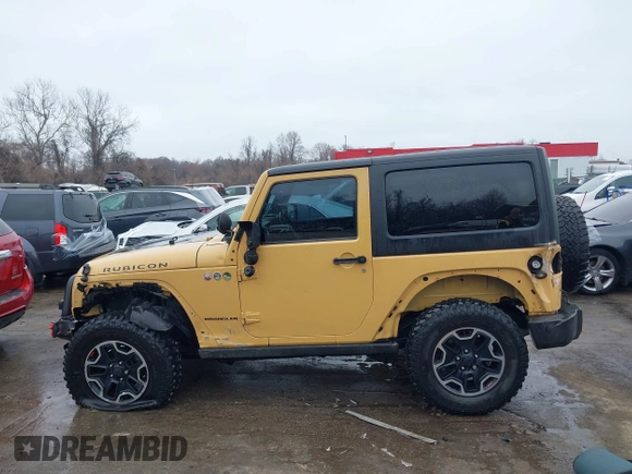2013 Jeep Wrangler Rubicon 10th Anniversary with VIN 1C4BJWCG5DL688504, listed as a IAAI auction lot 41797184 with 109,414 mi miles and . Bid and sale history available at DreamBid. Image 6.
