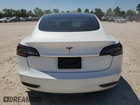 2020 Tesla Model 3 Standard Range Plus with VIN 5YJ3E1EA5LF599280, listed as a Copart auction lot 52383295 with 58,506 mi miles and Salvage Title. Bid and sale history available at DreamBid. Image 6.