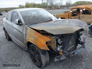 2016 BMW X4 xDrive28i with VIN 5UXXW3C55G0R20074, listed as a IAAI auction lot 42067204 with 91,169 mi miles. Bid and sale history available at carsss.com. Image 1.