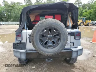 2016 Jeep Wrangler Unlimited Sport with VIN 1C4BJWDG8GL346676, listed as a Copart auction lot 57972665 with 57,515 mi miles and Salvage title. Bid and sale history available at DreamBid. Image 6.