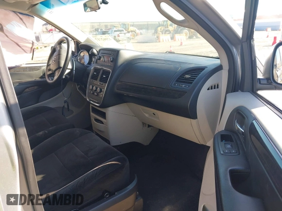 2014 Dodge Grand Caravan SXT 30th Anniversary with VIN 2C4RDGCG3ER119994, listed as a IAAI auction lot 42062017 with 96,909 mi miles and . Bid and sale history available at DreamBid. Image 5.