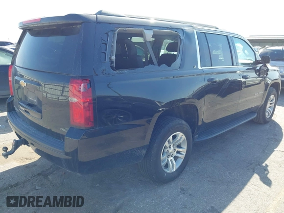 2019 Chevrolet Suburban LT with VIN 1GNSKHKC3KR285095, listed as a IAAI auction lot 41851014 with 151,075 mi miles and . Bid and sale history available at DreamBid. Image 4.