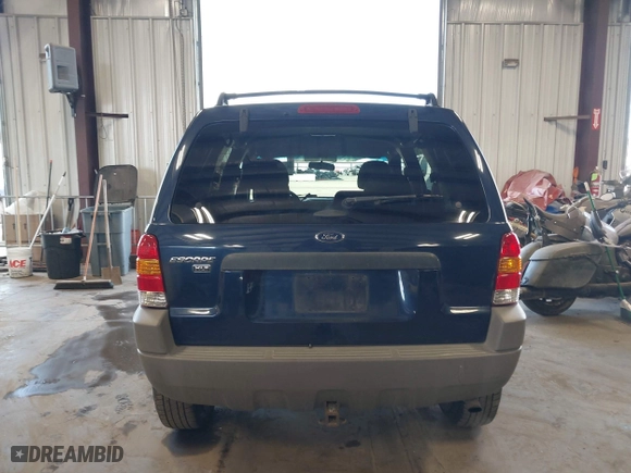 2002 Ford Escape XLT with VIN 1FMCU031X2KA37050, listed as a IAAI auction lot 42024674 with 199,249 mi miles. Bid and sale history available at carsss.com. Image 16.