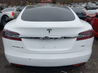 2016 Tesla Model S 90D with VIN 5YJSA1E26GF155962, listed as a IAAI auction lot 41348998 with 134,269 mi miles and . Bid and sale history available at DreamBid. Image 16.