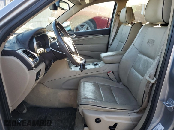 2014 Jeep Grand Cherokee Overland with VIN 1C4RJFCG0EC226397, listed as a Copart auction lot 80295784 with 131,921 mi miles and Salvage Title. Bid and sale history available at DreamBid. Image 7.