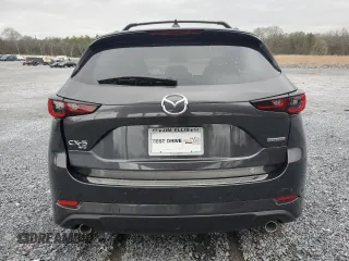 2025 Mazda CX-5 2.5 S Premium Plus Package with VIN JM3KFBEM8S0565119, listed as a Copart auction lot 47956415 with 0 mi miles and Salvage Title. Bid and sale history available at carsss.com. Image 6.