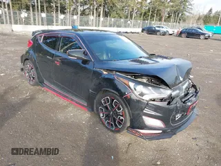 2016 Hyundai Veloster z VIN KMHTC6AD6GU260023, wystawiony jako IAAI lot #41627353 z przebiegiem 98 472 mil mil oraz . Historia ofert i sprzedaży dostępna na DreamBid. Obrazek 1.
