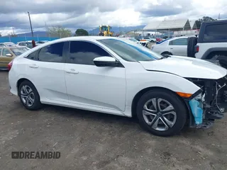 2018 Honda Civic LX with VIN 2HGFC2F5XJH603214, listed as a IAAI auction lot 41788384 with 114,876 mi miles and . Bid and sale history available at carsss.com. Image 14.