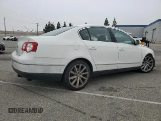 2008 Volkswagen Passat z VIN WVWCU73C58P028217, wystawiony jako Copart lot #52451275 z przebiegiem 70 829 mil mil oraz Szkoda całkowita • Salvage title. Historia ofert i sprzedaży dostępna na DreamBid. Obrazek 3.