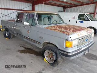 1989 Ford F-350 with VIN 2FTJW35M9KCA56949, listed as a IAAI auction lot 42244693 with 81,044 mi miles and . Bid and sale history available at DreamBid. Image 1.