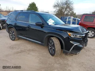 2024 Honda Pilot Touring with VIN 5FNYG1H72RB007519, listed as a IAAI auction lot 40973780 with 24,908 mi miles. Bid and sale history available at carsss.com. Image 1.