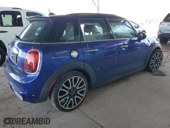 2019 MINI Hardtop 4 Door Cooper S z VIN WMWXU3C58K2H55626, wystawiony jako Copart lot #54404175 z przebiegiem 65 209 mil mil oraz Szkoda całkowita • Salvage title. Historia ofert i sprzedaży dostępna na DreamBid. Obrazek 3.