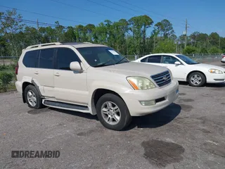2003 Lexus GX 470 with VIN JTJBT20X630019033, listed as a IAAI auction lot 42128698 with 286,811 mi miles and . Bid and sale history available at DreamBid. Image 1.