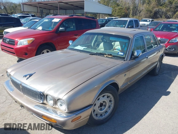 1998 Jaguar XJ Vanden Plas with VIN SAJKX6242WC823240, listed as a IAAI auction lot 41605734 with Not Provided miles and . Bid and sale history available at DreamBid. Image 2.
