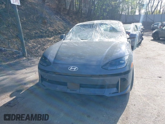 2024 Hyundai Ioniq 6 SEL z VIN KMHM34AC0RA076572, wystawiony jako IAAI lot #42188178 z przebiegiem 1 828 mil mil oraz . Historia ofert i sprzedaży dostępna na DreamBid. Obrazek 12.