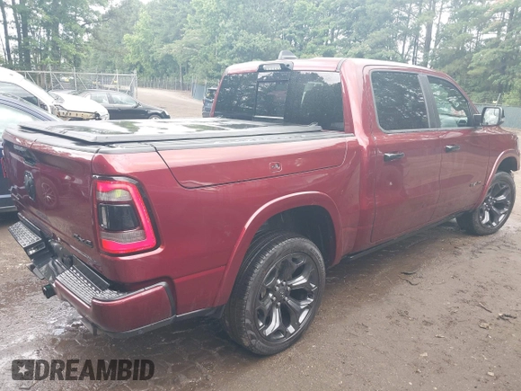 2023 Ram 1500 Limited with VIN 1C6SRFHM2PN509939, listed as a IAAI auction lot 42514018 with 31,669 mi miles and . Bid and sale history available at DreamBid. Image 4.