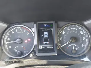 2021 Toyota Tacoma SR5 z VIN 3TMDZ5BN6MM110938, wystawiony jako IAAI lot #41838703 z przebiegiem 67 680 mil mil oraz . Historia ofert i sprzedaży dostępna na DreamBid. Obrazek 7.