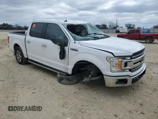 2020 Ford F-150 XL with VIN 1FTEW1CP4LKD98311, listed as a Copart auction lot 87605575 with 153,353 mi miles and Salvage Title. Bid and sale history available at carsss.com. Image 4.