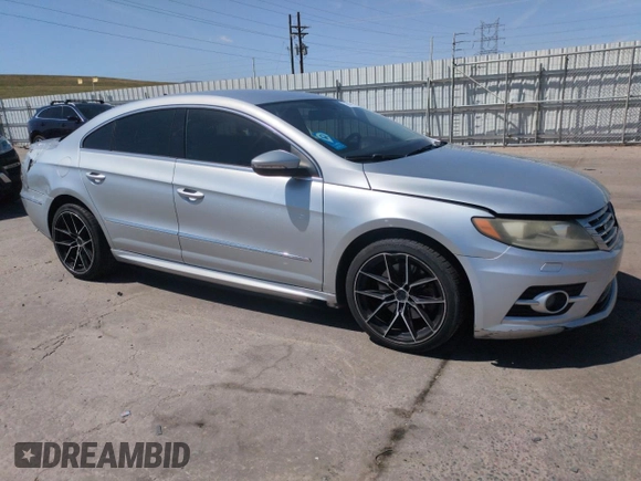 2013 Volkswagen CC Sport Plus z VIN WVWBP7AN2DE558965, wystawiony jako Copart lot #52894795 z przebiegiem 171 734 mil mil oraz Szkoda całkowita • Salvage title. Historia ofert i sprzedaży dostępna na DreamBid. Obrazek 4.