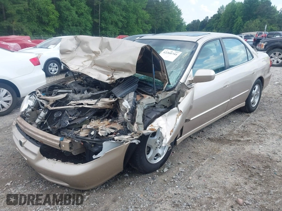 2000 Honda Accord EX z VIN 1HGCG1653YA030361, wystawiony jako IAAI lot #42268744 z przebiegiem 53 809 mil mil oraz . Historia ofert i sprzedaży dostępna na DreamBid. Obrazek 19.