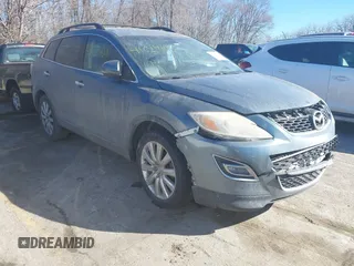 2010 Mazda CX-9 Sport z VIN JM3TB2MA7A0211887, wystawiony jako IAAI lot #41624108 z przebiegiem 238 214 mil mil oraz . Historia ofert i sprzedaży dostępna na DreamBid. Obrazek 1.