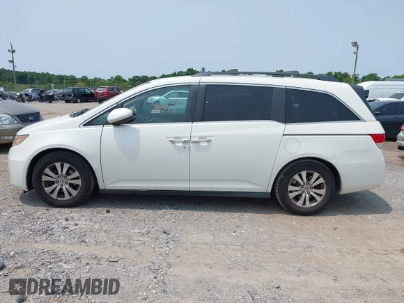 2014 Honda Odyssey EX-L with VIN 5FNRL5H62EB109573, listed as a IAAI auction lot 42387637 with 208,061 mi miles and . Bid and sale history available at DreamBid. Image 14.