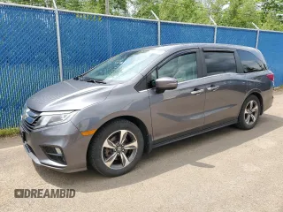 2018 Honda Odyssey z VIN 5FNRL6H49JB504977, wystawiony jako Copart lot #60905615 z przebiegiem 180 464 mil mil oraz Czysty tytuł • Clean title. Historia ofert i sprzedaży dostępna na DreamBid. Obrazek 1.