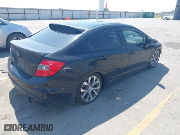 2012 Honda Civic Si z VIN 2HGFB6E57CH700823, wystawiony jako IAAI lot #42477635 z przebiegiem 144 889 mil mil oraz . Historia ofert i sprzedaży dostępna na DreamBid. Obrazek 4.