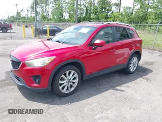 2014 Mazda CX-5 Grand Touring with VIN JM3KE2DY3E0382920, listed as a IAAI auction lot 42102876 with 324,608 mi miles. Bid and sale history available at carsss.com. Image 2.