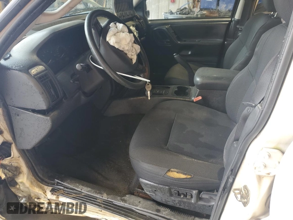 2004 Jeep Grand Cherokee Laredo z VIN 1J4GW48S74C165732, wystawiony jako Copart lot #56316885 z przebiegiem 177 139 mil mil oraz Szkoda całkowita • Salvage title. Historia ofert i sprzedaży dostępna na DreamBid. Obrazek 7.