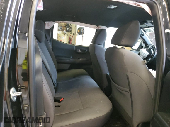 2019 Toyota Tacoma SR z VIN 5TFCZ5AN1KX196812, wystawiony jako Copart lot #51372065 z przebiegiem Nie podano mil oraz Szkoda całkowita • Salvage title. Historia ofert i sprzedaży dostępna na DreamBid. Obrazek 10.